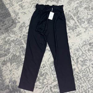 Black paper bag trousers